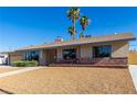 Single story home with a gravel front yard and walkway at 1727 Cherokee Ln, Las Vegas, NV 89169