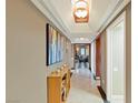 Elegant hallway with wood flooring and modern artwork at 2747 Paradise Rd # 404, Las Vegas, NV 89109