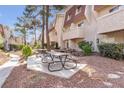 Community picnic area with shaded tables and benches at 3597 Arville St # 201C, Las Vegas, NV 89103