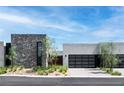 Stylish home featuring stone and stucco exterior at 6851 Milos Rd, Las Vegas, NV 89118