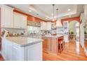 Gourmet kitchen, granite counters, and hardwood floors at 380 Claremont St, Boulder City, NV 89005