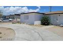 View of the home's exterior and driveway at 1932 Lawry Ave, North Las Vegas, NV 89032