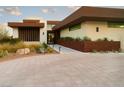 Modern home with courtyard entry and landscaping at 11587 Stardust Dr, Las Vegas, NV 89135