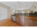 Modern kitchen with stainless steel appliances and granite countertops at 9331 Hilgard Ave, Las Vegas, NV 89178