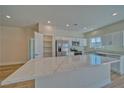 Modern kitchen with stainless steel appliances and quartz countertops at 5130 Valero Ct, Pahrump, NV 89060