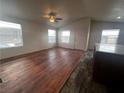 Living room with wood-look floors and ceiling fan at 880 Montecito Dr, Pahrump, NV 89048