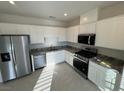 Modern kitchen with stainless steel appliances and granite countertops at 662 Bellus Pl # Lot 189, Henderson, NV 89015