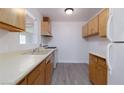 Bright kitchen featuring ample cabinetry and new flooring at 1105 I, Boulder City, NV 89005