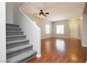 Gray carpeted staircase leading to the upper level at 6045 Crystal Talon St, Las Vegas, NV 89130