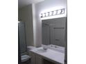 Bathroom with vanity, shower, and toilet at 1501 Linnbaker Ln # 103, Las Vegas, NV 89110