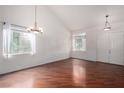 Bright living room featuring hardwood floors and a high ceiling at 8225 Romantic Sunset St, Las Vegas, NV 89131