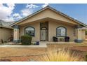 House exterior with covered entryway and seating at 3241 E Winery Rd, Pahrump, NV 89048