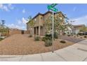 Two-story house with landscaped yard, driveway, and neutral exterior at 10420 Seelos St, Las Vegas, NV 89178