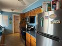 Kitchen with stainless steel appliances and wood cabinets at 2315 Beverly Way, Las Vegas, NV 89104