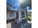 House exterior showcasing a covered patio and landscaping at 2932 Demetrius Ave, Las Vegas, NV 89101