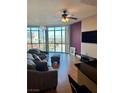 Living room with hardwood floors and city view at 200 W Sahara Ave # 810, Las Vegas, NV 89102