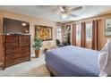 Spacious bedroom with large dresser and comfortable bed at 1375 E Hacienda Ave # 114, Las Vegas, NV 89119