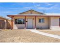 Charming Ranch style home with covered porch at 3112 Dillon Ave, North Las Vegas, NV 89030