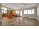 Spacious kitchen with island, wood cabinets, granite counters at 3590 Yorba Linda Dr, Las Vegas, NV 89122