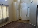 Bright and spacious entryway with tile flooring and neutral walls at 3337 Autumn Veil St, Las Vegas, NV 89129