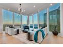 Luxury living room boasts stunning city views & modern furniture at 3722 Las Vegas Blvd # 3601, Las Vegas, NV 89158