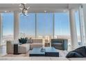 Spacious living area with city views and contemporary furnishings at 3722 Las Vegas Blvd # 3601, Las Vegas, NV 89158