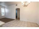 Bright dining area with tile flooring and chandelier at 2201 Ramsgate Dr # 811, Henderson, NV 89074