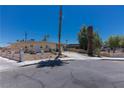 Ranch-style house with driveway and landscaping at 1312 Denarius Cir, Las Vegas, NV 89101