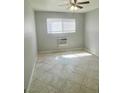 Spacious bedroom with tile floors and ceiling fan at 5362 Swenson St # 43, Las Vegas, NV 89119