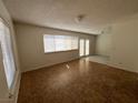 Spacious living room with tile floors and access to a patio at 3900 Milford Pl, Las Vegas, NV 89102