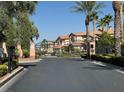 Gated entrance to the community with landscaping at 1024 Eaglewood Dr, Las Vegas, NV 89144