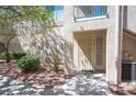 Condo entrance with walkway and landscaping at 5710 E Tropicana Ave # 1112, Las Vegas, NV 89122