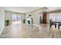 Spacious living room featuring hardwood floors and a fireplace at 2221 Palora Ave, Las Vegas, NV 89169