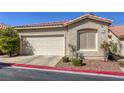 Single car garage, front view of home at 3353 Kylemore St # 101, Las Vegas, NV 89129