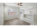 Simple dining room with hardwood floors and built in shelving at 4805 Principle Ct, North Las Vegas, NV 89031