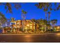 Elegant two-story home with palm trees and landscape lighting at 2994 San Lorenzo Ct, Henderson, NV 89052