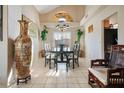 Formal dining room with a large table and Asian-inspired decor at 2619 White Pine Dr, Henderson, NV 89074