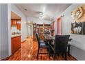 Bright dining room with a granite-top table and wooden cabinetry at 4428 Halbert Ave # 0, Las Vegas, NV 89110