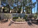 Community entrance with landscaping and signage at 5250 S Rainbow Blvd # 2126, Las Vegas, NV 89118