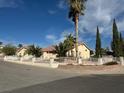 Single story home with a landscaped yard at 5095 N Park St, Las Vegas, NV 89149