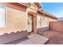 Home's entrance with a decorative wreath and a walkway at 2846 Mount Hope Dr, Las Vegas, NV 89156