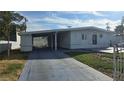 Ranch style home with carport and front yard at 2417 E Wilson Ave, Las Vegas, NV 89101