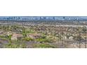 Community view with Las Vegas skyline in background at 198 Shaded Canyon Dr, Henderson, NV 89012