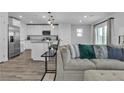 Modern kitchen with white cabinets and granite counters at 6294 Whippet Ave, Las Vegas, NV 89122