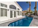 Luxury pool with spa and spacious patio at 8125 Sunset Cove Dr, Las Vegas, NV 89128