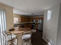 Kitchen with granite countertops and stainless steel appliances at 10413 Coyote Cub Ave, Las Vegas, NV 89129