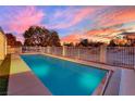 Relaxing rectangular pool with patio and landscape views at 7457 Painted Shadows Way, Las Vegas, NV 89149