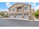 Three-story townhome with three-car garage at 6041 Riverwalk Falls St # 102, North Las Vegas, NV 89031