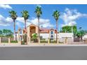 Two-story home with gated entrance and palm trees at 2131 Diamond Bar Dr, Las Vegas, NV 89117