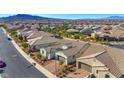 Aerial view of a house and surrounding neighborhood at 593 Comodo St, Henderson, NV 89011